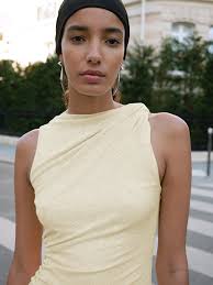 Spun from cotton fibres and yarn-dyed threads , this knit reveals a subtle  yet textural finish. Explore the Sasha Dress and Poppy Top in our newest  yellow jersey styles. #ANNAQUAN #Resort26 #NewArrivals