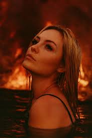 Create a 3/4 profile with a strong contrast 35mm film portrait in wate...