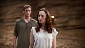 The majority of the human race have been possessed by unseen invaders, leaving only small pockets of wild humans like melanie stryder (saoirse ronan) scattered throughout the world. Saoirse Ronan In The Host From A Stephenie Meyer Novel The New York Times