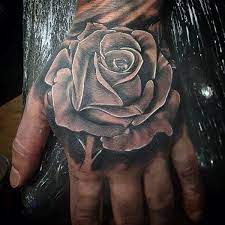 Tattoos with meanings & designs. 75 Black And White Tattoos For Men Masculine Ink Designs Rose Tattoos For Men Hand Tattoos For Guys Rose Hand Tattoo