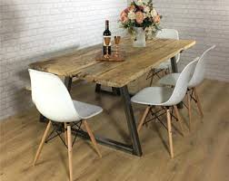 A round, wood table by pierre is a great option for a small dining room area. Dining Sets Etsy Uk
