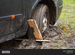 How to recover your car from mud. Car Wheel Stuck Mud Image Photo Free Trial Bigstock