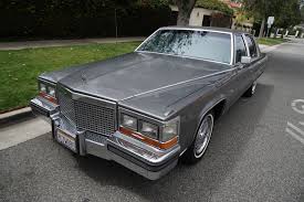 Image result for Light Driftwood 1987 Cadillac