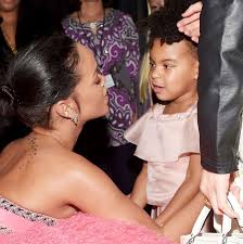 Rihanna's electric hair radiates different shades of blue throughout the video, with the bright turquoise transitioning into a darker blue at the ends. Blue Ivy Unsure Whether Rihanna Is A Real Princess Or Just Rihanna