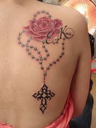 A cool design involving rosary beads and a cross. Rosary Beads Arm Tattoo Novocom Top