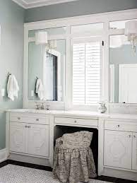 As reference, for the recent bathroom renovation, i installed the mirrors at 44 inches from the floor, which is 9 inches between the sink and. Bathroom Vanity Lights Mounted On Trimmed Out Plate Mirror Window Between Sinks Modern Bathroom Decor Bathrooms Remodel Glamorous Bathroom Decor