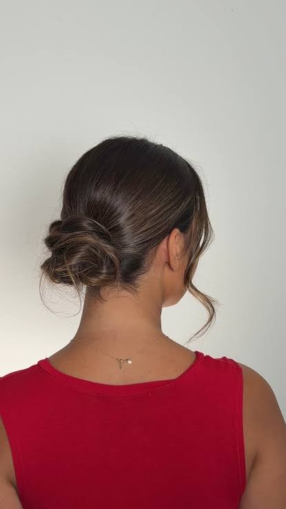 Wedding guest hair of dreams. A low bun with the most beautiful ...