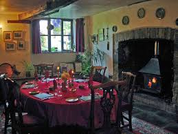 The long and relatively narrow refectory table was originally used in the dining halls (refectories) of medieval monasteries and convents. Breakfast In The Medieval Dining Room Next To A Crackling Log Fire Huxtable Farm