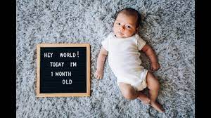 Using local flowers or a professional florist, create a crown for you and your child. 1 Month Old Baby Photoshoot Youtube
