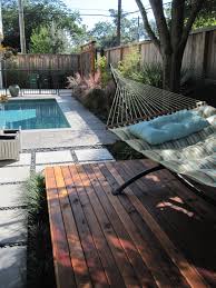 A Bit Of Bali In The Heights Ravenscourt Gardens In 2020 Floating Deck Sloped Backyard Backyard Oasis Diy