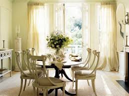 Lovely feature wall idea, and the crisp white table, same sky blue paint on the chairs, and modern light fixtures, gives it a less rustic appearance. Simple Yet Stunning Country Dining Table Ideas