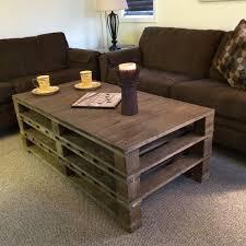The space between the boards is used here to store bottles of wine. Wooden Pallet Coffee Table Novocom Top