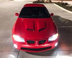 Image result for Light Driftwood 2004 Pontiac