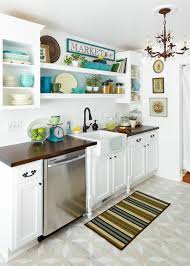 Set off crisply by the brown cabinets, the pendant lights are almost sculptural. 5bty2ntyd24acm