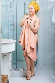 Young Cheerful Naked Woman Wiping Herself With Bath Towel In Bathroom Stock  Photo, Picture and Royalty Free Image. Image 59198657.