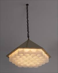 Light fixtures such as pendants and chandeliers can instantly brighten up a room. Beehive Hanging Lamp In Brass By George Nelson Usa 1960