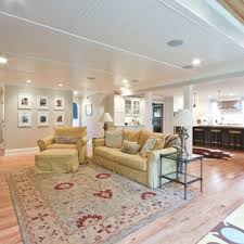 Slim table behind the sofa to keep drinks out of reach for children. Play Area Kids Living Room Ideas Photos Houzz