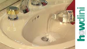 Block overflow hole with damp rag or cloth. How To Unclog A Sink Drain Youtube
