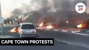 A wildfire which began on sunday on cape town's famed table mountain has destroyed several university campus buildings. Watch Early Morning Protests Close Cape Town Roads Youtube