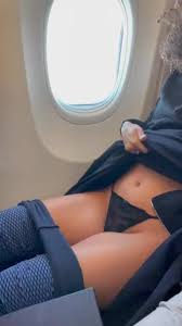 Kinky girl rubbing her pussy in a plane XXX Porn Video - PervertTube.com