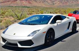 Find cheap car hire in melbourne, australia. White Lamborghini Parked Next To A Red Ferrari What A Beautiful Sentence Luxury Cars Luxury Car Rental Classic Car Rental