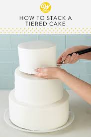 How To Make A Tiered Wedding Cake Wilton In 2020 Wedding Cake Decorations How To Make Wedding Cake Tiered Wedding Cake