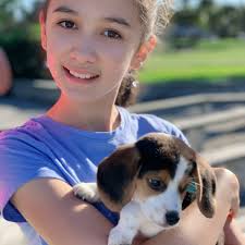 My beautiful girls with their new beast, Mr. Hockey himself.