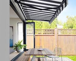 As you plan and design your deck, you'll have many choices to consider when it comes to awnings. Folding Arm Awning Melbourne Nicholls Interiors Brighton