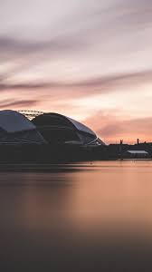 Football fans will appreciate the sports stadiums and cities of different countries represented in our application. Wallpaper Singapore National Stadium Dusk Sea Sunset 3840x2160 Uhd 4k Picture Image