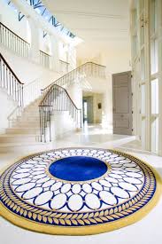 This construction method employs the use of a 'gun', which is a tool that is operated by hand and allows the artisan to punch strands of fibre into a canvas that is stretched across a frame. Wedgwood Renaissance Gold Rug My China Pattern Comes Ns A Rug Seriously I Need This Badly Rug Design Luxury Rug Rugs Australia