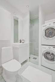 Each unit has three floors with two rooms on the lower level, two on the main/first floor and four on the upper/second floor level. Pin By Giss Arango On Bathroom Laundry Room Bathroom Laundry In Bathroom Small Bathroom
