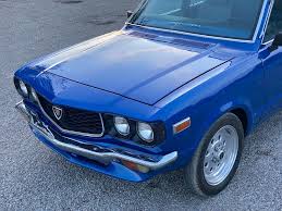 Image result for Phoenix Blue 1973 Mazda