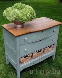 The drawers are configured with three across the top of the dresser, and four larger drawers in a double side by side pattern. 27 Dresser With Baskets Ideas Redo Furniture Home Diy Diy Furniture