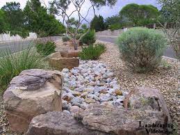 Xeriscaping, a philosophy in landscaping. Fake Rvier Bed Desert Xeriscape Landscaping With Rocks Rock Garden Landscaping Desert Landscaping