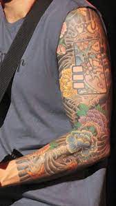 John mayer's tattoos enhance his personality making his body a 'wonderland'. This Arm John Mayer Tattoo Farm Tattoo Japanese Tattoo