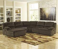 Toletta Chocolate Reclining Sectional With Left Press Back Chaise By Signature De Sectional Sofa With Chaise Sectional Sofa With Recliner Reclining Sectional