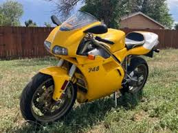 Image result for Nuget Yellow 1999 Motorcycle