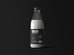 Mockup of three glass water bottles in a plain setting. Free Milk Bottle Mockup Free Package Mockups