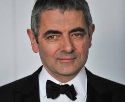 about to demonstrate a pickpocket's technique i'd like to meet the man who can get inside my trousers. British Comedy Photos Rowan Atkinson Black Adder Thin Blue Line Mr Bean British Comedy British Movies Mr Bean