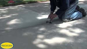 Both sierra stone and rubber stone are excellent choices for covering your existing concrete or asphalt. How To Resurface Cracked Concrete With Brickform Overlay Youtube