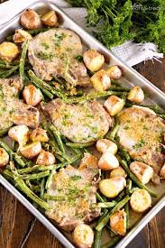 One Pan Parmesan Pork Chops And Veggies Recipe Juicy Pork Chops Baked In The Oven With Potatoes Pork Chop Dinner Healthy Pork Chops Healthy Pork Chop Recipes