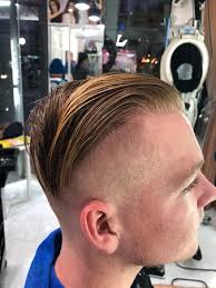 Slicked back hairstyles can transform medium length to long hair into a classy and polished style for men. Nice Haircut For Men In Patong Picture Of Golden Touch Massage Beauty Salon Phuket Tripadvisor