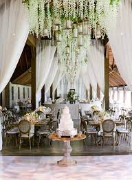 Stunning Wedding Reception Space With Dance Floor Draping And Floral Chandeliers Southern Wedding Wedding Classic Wedding Decorations