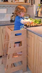 This helper is lightweight and easy to move thanks to our built in handles which can also be used for your child to hold onto as they climb up. Kitchen Helper Tower Australian Made Montessori Kitchen Stool Step Stool Cooking Toddler Decor Toddler Wooden Step In 2021 Kitchen Helper Diy Kids Kitchen Kitchen Stools
