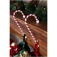 Perfect as ornaments on your mantle and a great way to spice up the fireplace for santa's arrival. Original Haute Decor Candy Cane Stocking Holders Anglo American