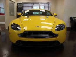 Image result for Sunburst Yellow 2012 Aston Martin