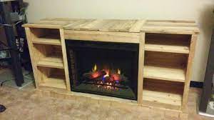 Willowton entertainment center with fireplace insert louisville warehouse. Pallet Media Cabinet Inside Fireplace Electric Fireplace Tv Stand Build A Tv Stand Living Room Tv Stand