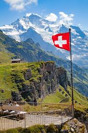 Until 1890 the arms of the white cross had the same width as their length. Swiss Flag On The Top Of Mannlichen Stock Image Colourbox
