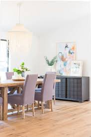 ivory fringe chandelier over rustic