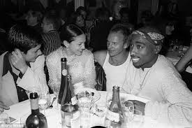 A group of young women, all friends, gather for a formal dinner party. 2pac On Twitter Ingrid Casares Madonna Sting And Tupac At A Dinner Party In 1994 Happy Birthday Madonna Http T Co 5junf68df6